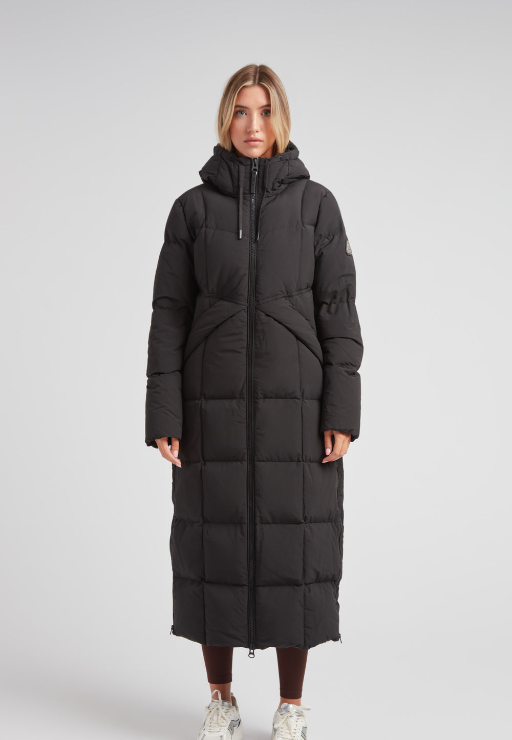 Black Star Extra Long Down Coat Matt Black on a model, showcasing a stylish, full-length, puffer design.