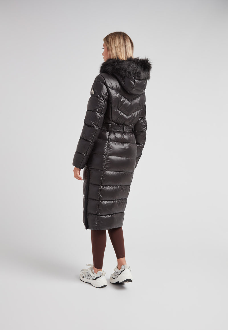 Women's puffer coat with fur hood in black, showcasing a sleek design and full-length silhouette.