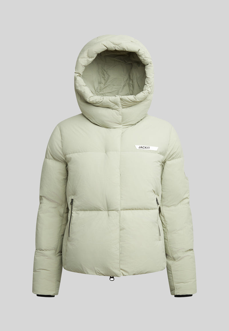 Star Shower Down Puffer Jacket Sage in light green with a hood, featuring a minimalist design and structured silhouette.