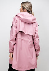 Womens Raincoat with Cape Dusty Pink showcasing back view with a lightweight design and hood.