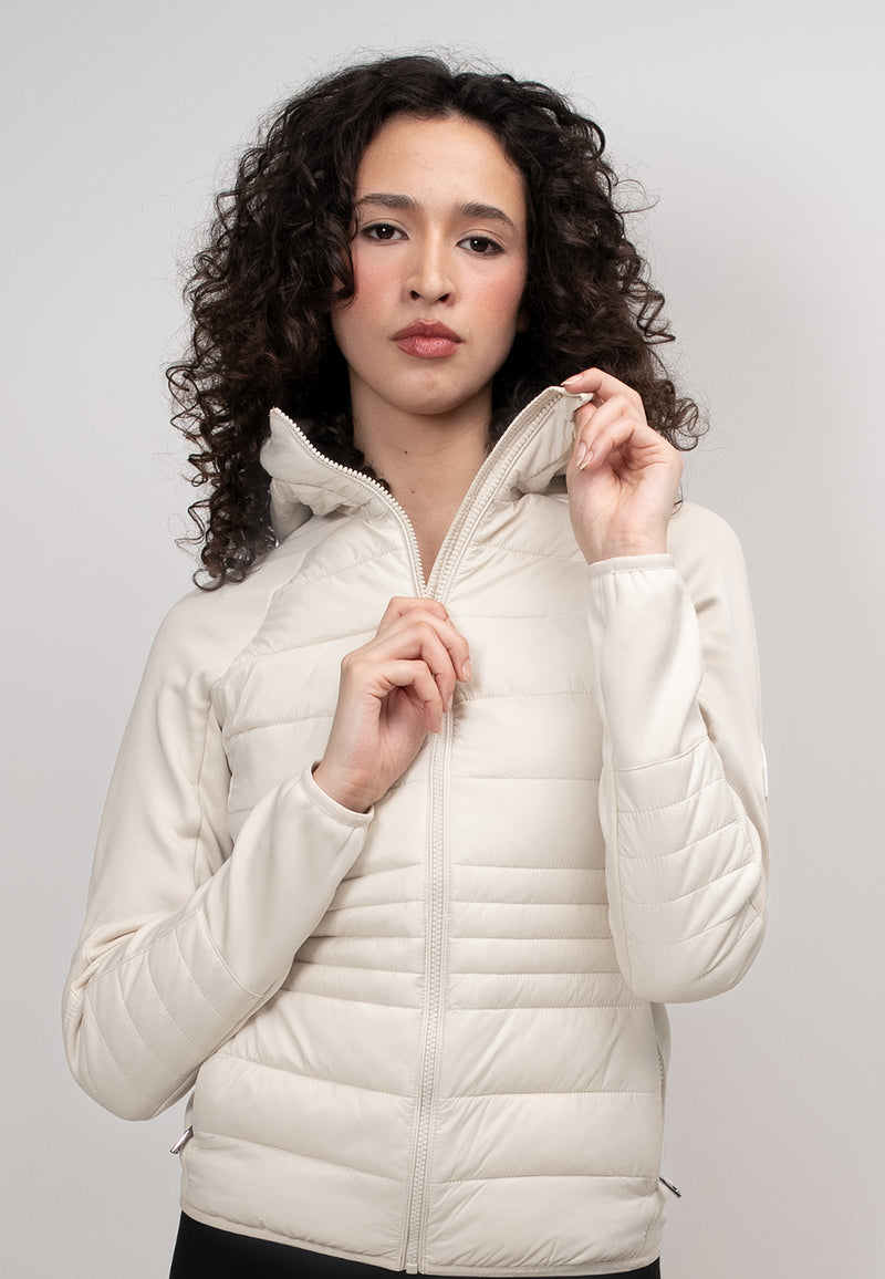 Womens Hybrid Hooded Jacket in Cream, featuring lightweight water-resistant fabric and fleece-backed sleeves.