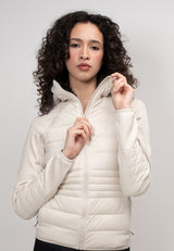 Womens Hybrid Hooded Jacket in Cream, featuring lightweight water-resistant fabric and fleece-backed sleeves.