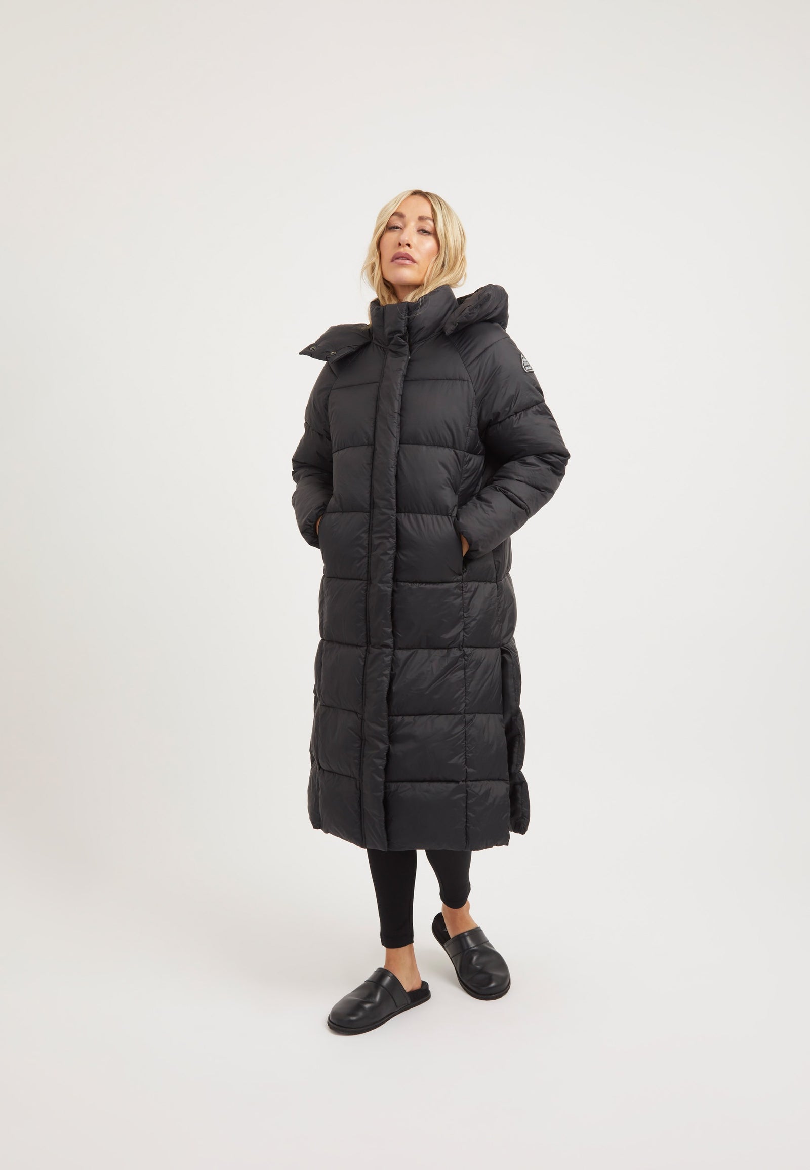 Cloud Boss Coat Black on model front view by JACK1T