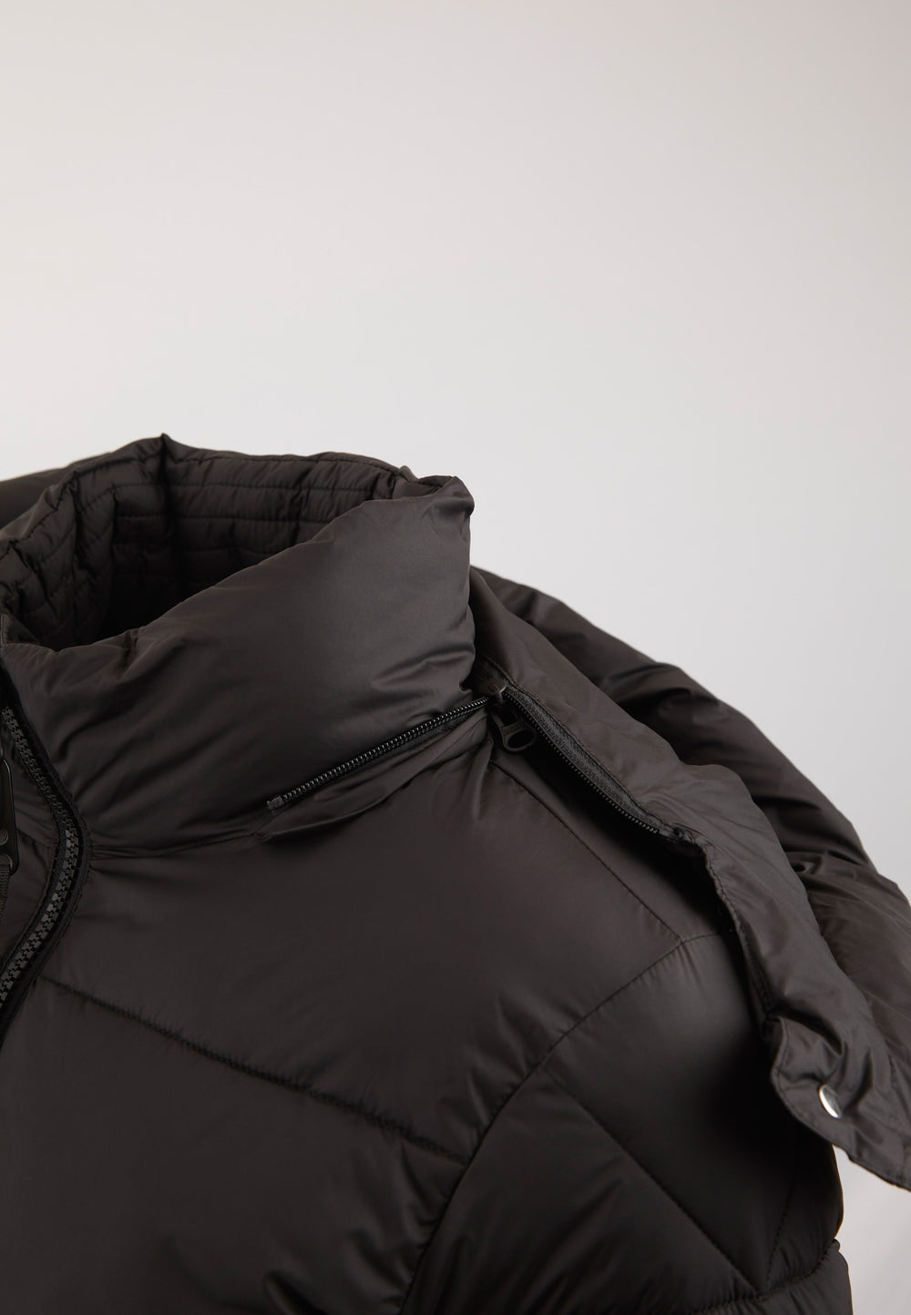 Helio Crop Duvet Jacket Black flat lay swatch