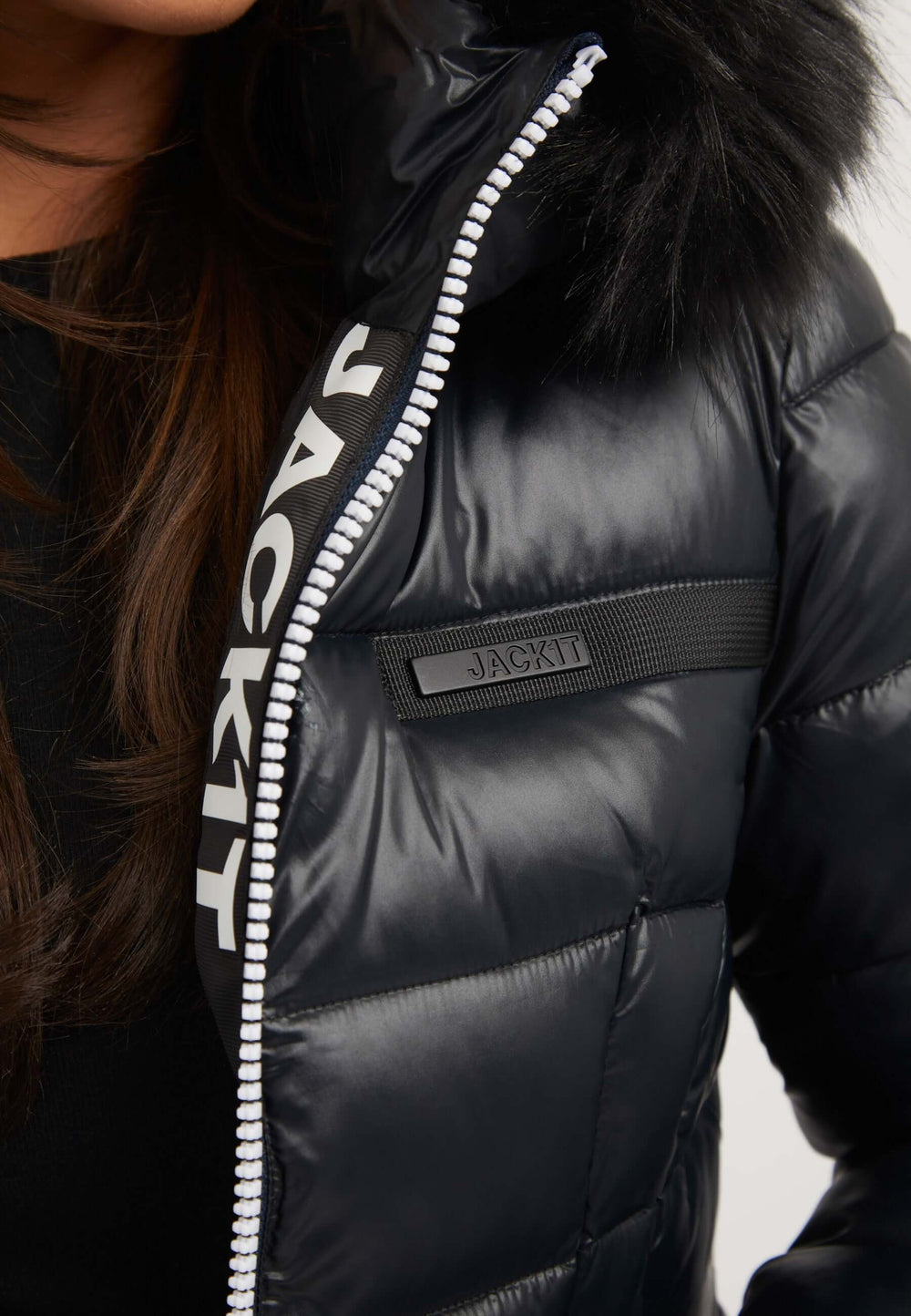 Close-up of the R4D Tricolore Racer Jacket Black, showcasing the fur trim and branding details, ideal for a black womens puffer jacket.